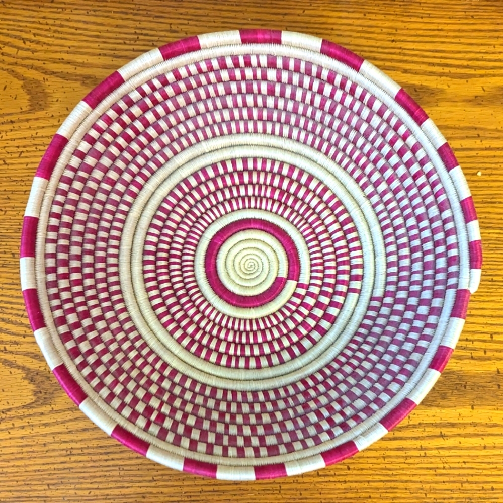 Handwoven red and white natural basket